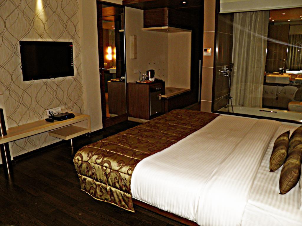 Sentosa Resorts & Water Park Chinchvad Pokoj fotografie